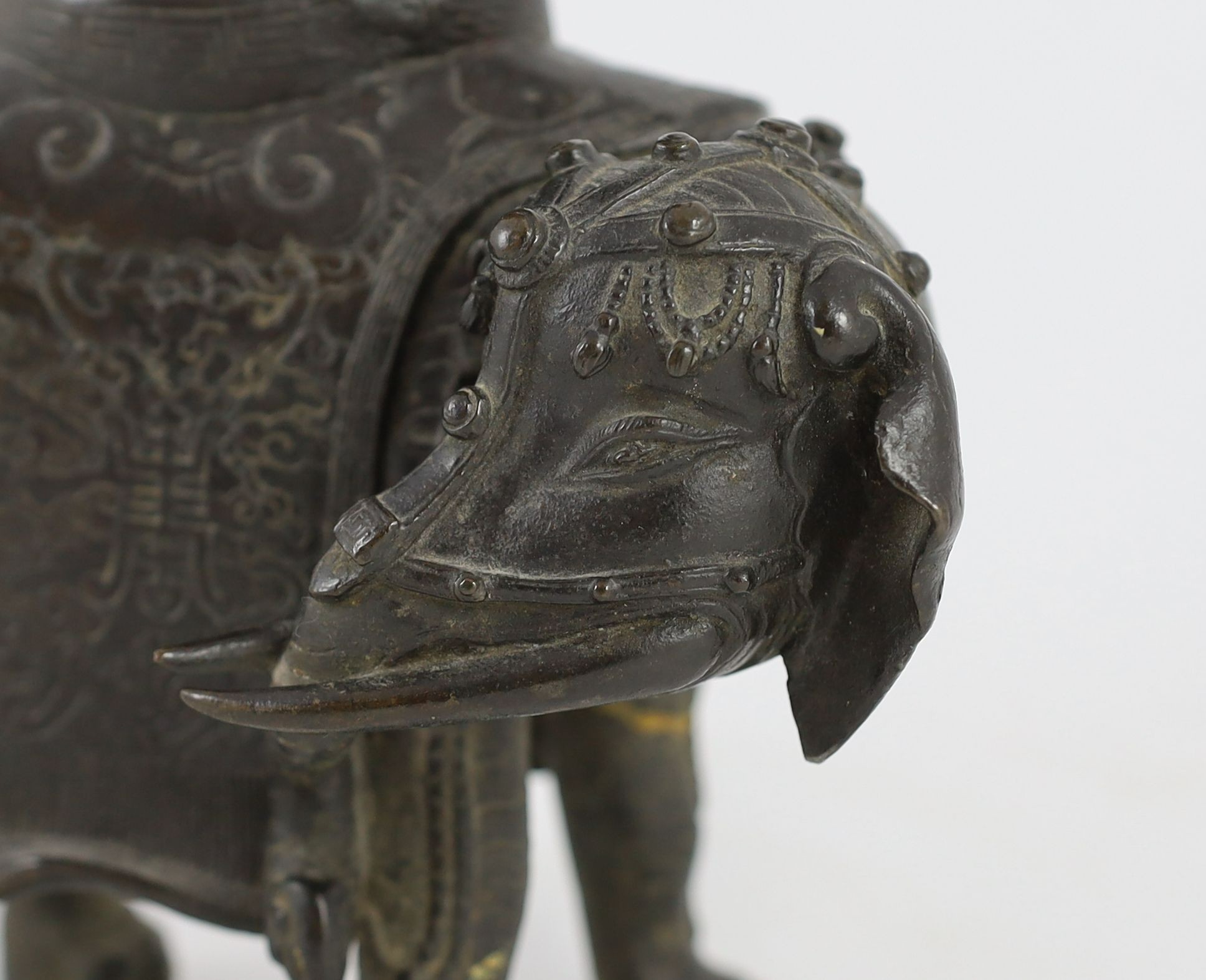 A Chinese bronze ‘elephant’ vessel, late Ming dynasty, 36cm high, Repairs